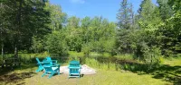 The Copper Squirrel is a secluded full log cabin on 10 acres. Hotels near Halvor Reiten Park and Public Beach