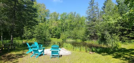 The Copper Squirrel is a secluded full log cabin on 10 acres.