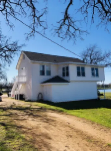 Small but cozy apartment style lakefront home on Buchanan Dam with great views!