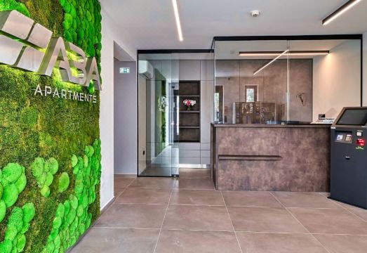 Aba 아파트 주차장 및 건물