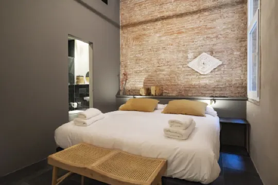 Hostal Porxos Garden Отели в г. Барселона