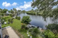 Luxe Riverfront Home on 1-Acre Lot w/ Private Dock, Hot Tub & Screened Deck Hotel di Bonita Springs