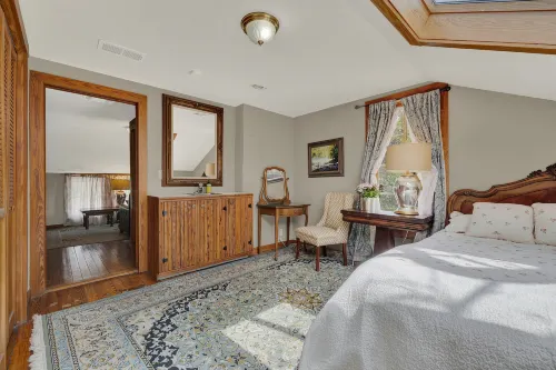 Luxurious Jacuzzi Tub and Cozy Porch Setup - Inviting Charming Retreat