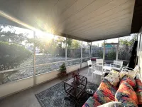 Cozy Outdoor Patio and Fully Stocked Kitchen - Stylish Escape