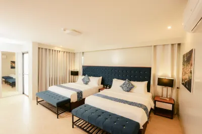 The Madeline Boutique Hotel & Suites Hotel in zona BAHAY ALUMNI