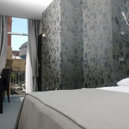 MH Design Hotel Отели рядом с достопримечательностью «Площадь Пьяцца-дель-Плебишито»