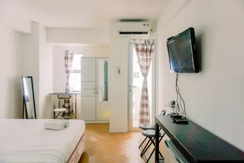 ห้องสตูดิโอในสไตล์ที่อบอุ่นและง่าย ๆ Urbantown Serpong Apartment