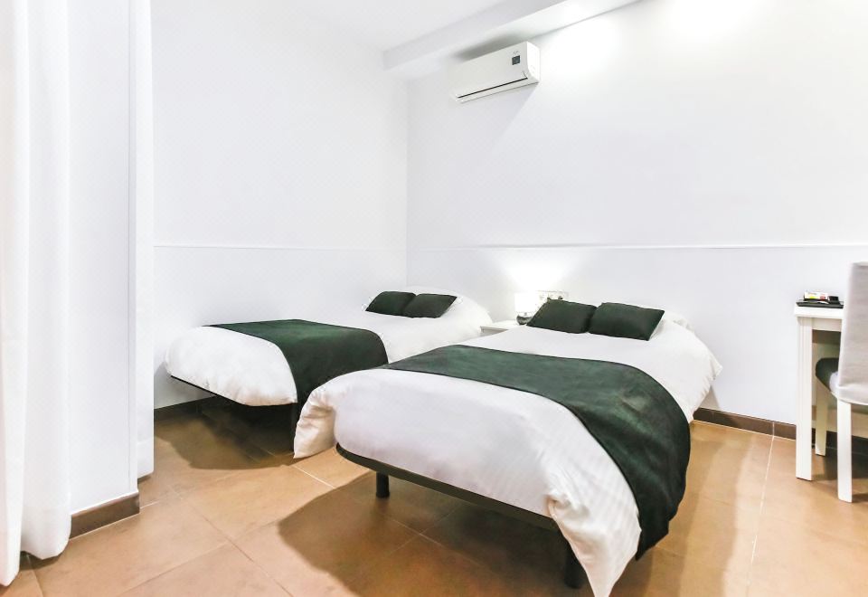 라라몬드 바르셀로나 룸의 아늑한 객실 분위기