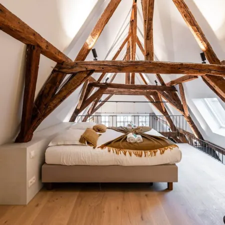 Huswell - City-View Loft with Wooden Beams and Mezzanine