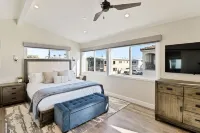 Located directly on the Sand. Two Master Suites, four bedrooms, four bathrooms.