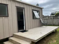 Cozy two story hideaway Hotels in Whangamata