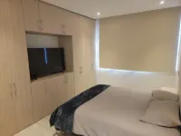 "Charming and Comfortable Retreat: A Warm, Cozy and Beautiful New Apartment"