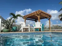 Private Pool overlooking ocean, large deck on Estate Property.  Great Privacy.