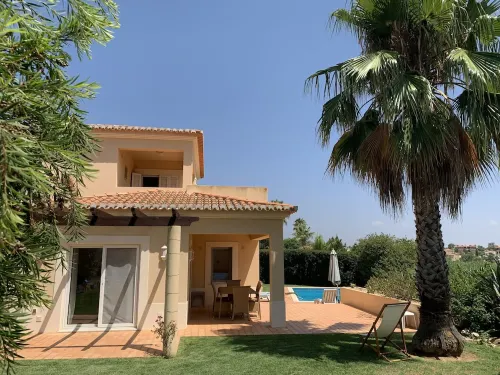 Large private detached three bedroom villa with heated infinity swimming pool