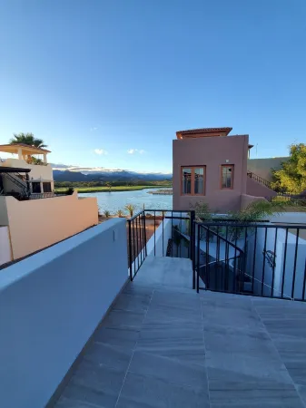 Pristine 3-bed, 3.5-bath villa with mountain, golf course, sea views & hot tub