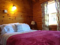 Cajun Cedar Log Cottages Ltd