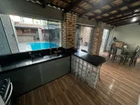 House with swimming pool and barbecue.