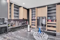 This Miami Vice Villa home is a stunning Saltwater Heated pool/Jacuzzi spa Oasis