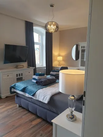 Apartment with lake view / guest apartment 12 km from Motorsportarena Oschersleben Отели в г. Ванцлебен-Бёрде