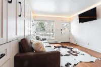 Ajax views and river patio! Newly remolded with King Murphy bed!