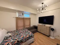 JFam Suites - chambre d’hôtes