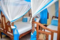 Blue Earth Beach Bungalow - Strand