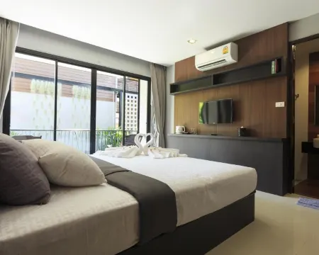 ห้องดีลักซ์ เตียงแฝด พร้อมระเบียงไม่มีวิว