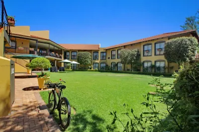 Benvenuto Hotel & Conference Centre Hotels near Zoo Lake