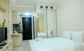 Simply Studio Room at Grand Serpong Apartment by Travelio