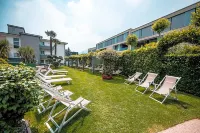 Ascona Lodge, Pool & Garden Retreat - balcony