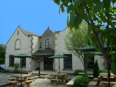 Priory Inn Hotel dekat Highgrove Gardens