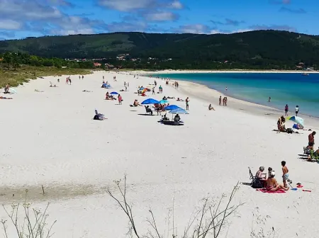 The apartment is located in front of Langosteira beach, with stunning views.