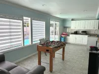 Quiet Pool Haven: 4BR - 9PPL, AC, WiFi, and Beaches Nearby