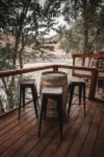 Mid-century modern cowboy retreat with a 35-ft. deck on the Salmon River.