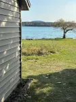 Oceanfront cabin with private beach and hot tub