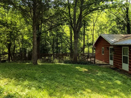 Our creekside cabin is nestled deep in the country on a secluded lane.