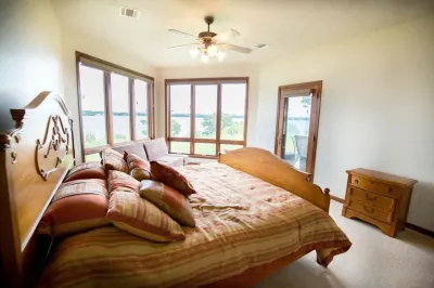 Prime Lakefront East Okoboji Condo at Bridges Bay Jet Ski Lift rental available!