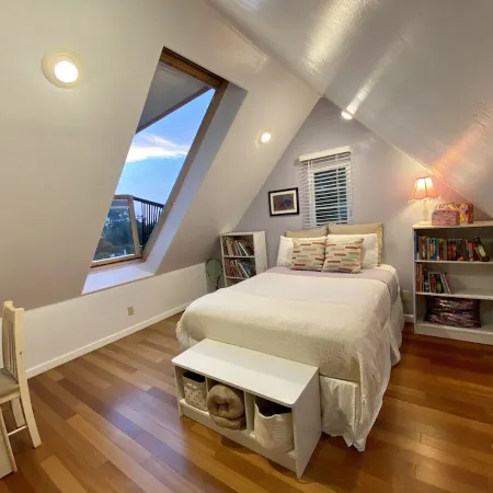 Family-friendly summer vacation home with big hot tub 2 blocks from beach.