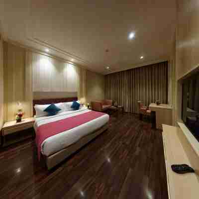 Palm Green Hotel and Resorts Rooms