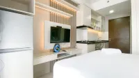 Simple and Cozy Living Studio Transpark Cibubur Apartment Отели в г. Джакарта