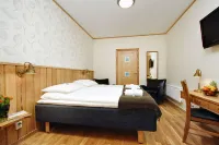 Lannalodge Hoteles cerca de Station Östra Tysslinge