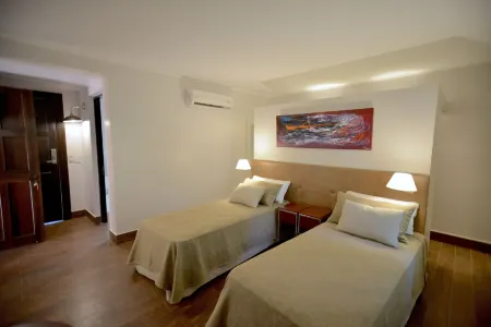 Hotel Guaminí Misión Отели рядом с достопримечательностью «Bus terminal»