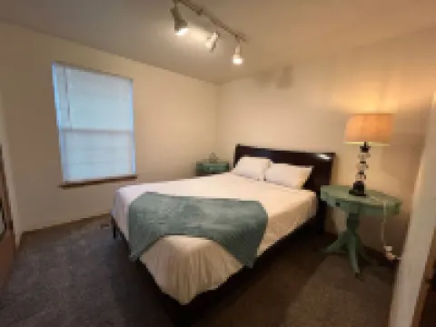 Vintage Ms. Pac-Man Arcade and Cozy Ambiance - Charming Retro Oasis