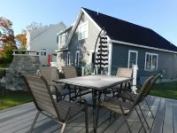 Tranquil Back Deck and Club Amenities - Spacious Coastal Retreat