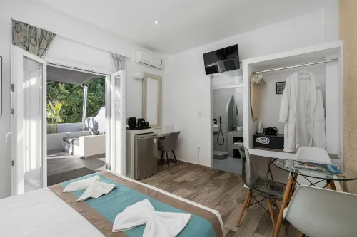 Oasis Hotel Отели в г. Санторини
