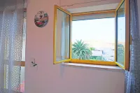 バルコニーとエアコン付きの休日の家 'casa Vacanze Alba A Otranto'