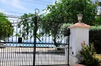 Welcome to the Unpretentious and Breezy Graceville, Steps Away from the Beach