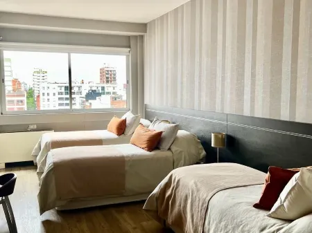 Sarum Hotel Design Отели в г. Сан Исидро