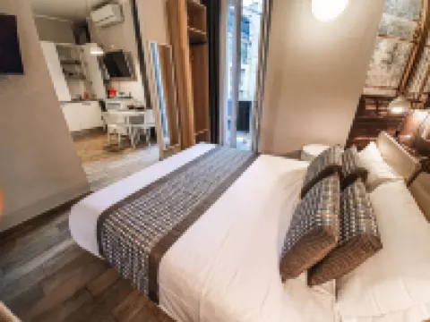 Aparthotel Meneghino Отели в г. 