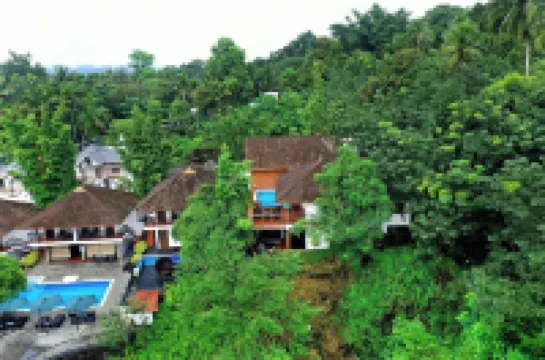 Athirapally Green Trees Hotels in Pariyaram